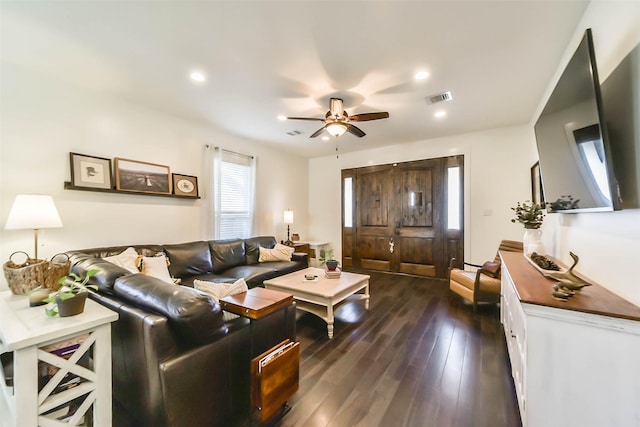 living room featuring recessed lighting, visible vents, a ceiling fan, and dark wood-style flooring