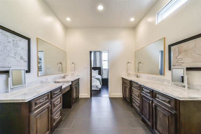 bathroom featuring vanity and a high ceiling