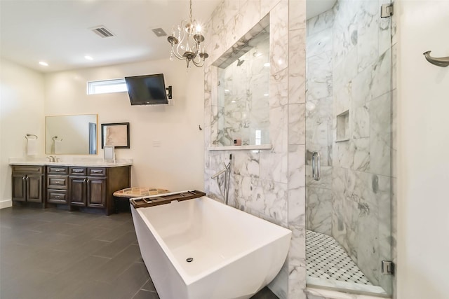 bathroom with tile patterned flooring, plus walk in shower, vanity, and a chandelier