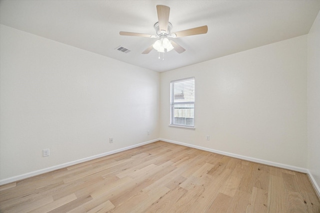 unfurnished room with ceiling fan and light hardwood / wood-style floors