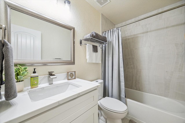 full bathroom featuring shower / bathtub combination with curtain, vanity, and toilet