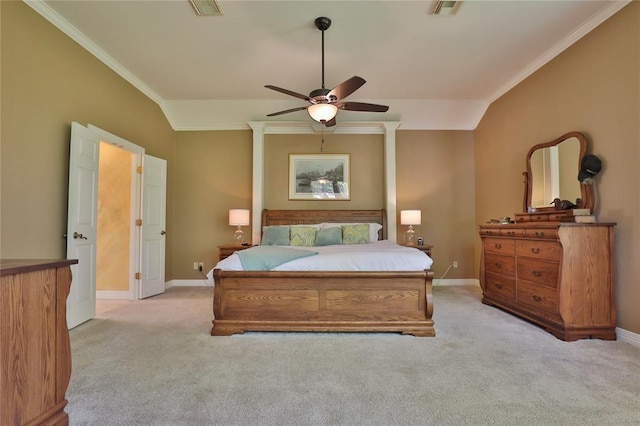 carpeted bedroom featuring crown molding, vaulted ceiling, and ceiling fan