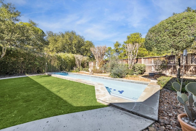 exterior space with a yard and a patio area