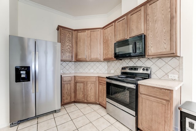 kitchen featuring stainless steel appliances, ornamental molding, light tile patterned floors, and backsplash