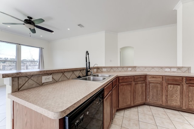 kitchen with sink, crown molding, light tile patterned floors, dishwasher, and kitchen peninsula