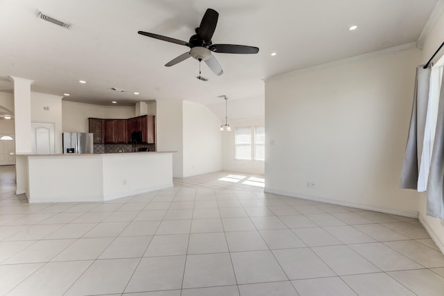 unfurnished living room with ceiling fan, ornamental molding, and light tile patterned floors