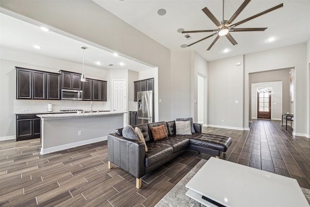 living room featuring ceiling fan