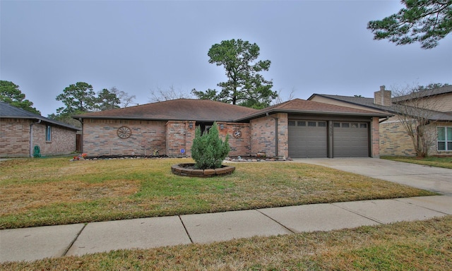 single story home featuring a garage and a front lawn