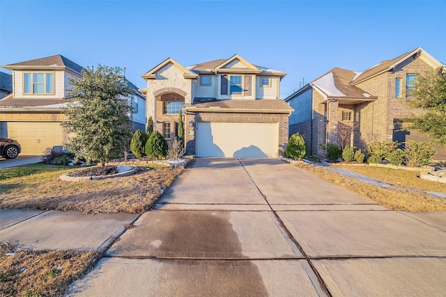 view of front of property with a garage