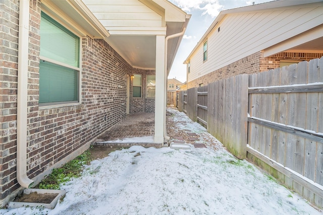 view of yard covered in snow