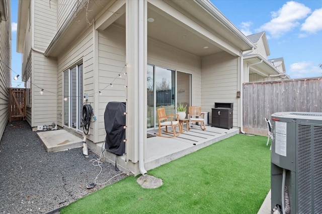 exterior space with a grill and central air condition unit