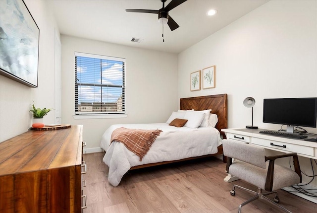 bedroom featuring light wood-type flooring and ceiling fan