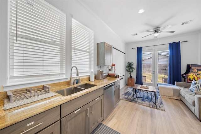 kitchen with dishwasher, sink, ornamental molding, ceiling fan, and light hardwood / wood-style floors