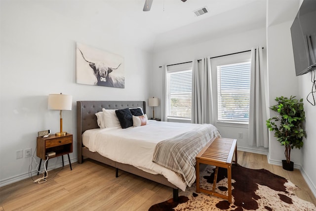 bedroom featuring ceiling fan and light hardwood / wood-style floors