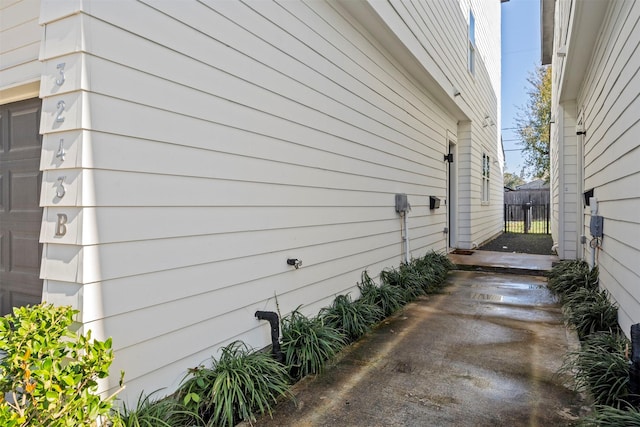 view of side of property featuring a garage