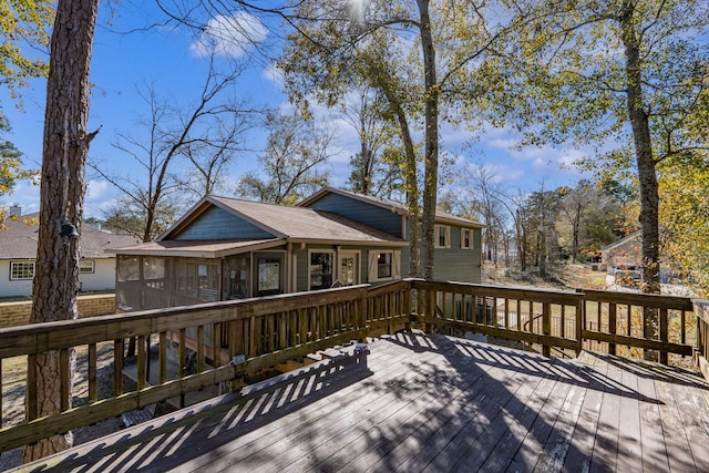 wooden terrace with a sunroom