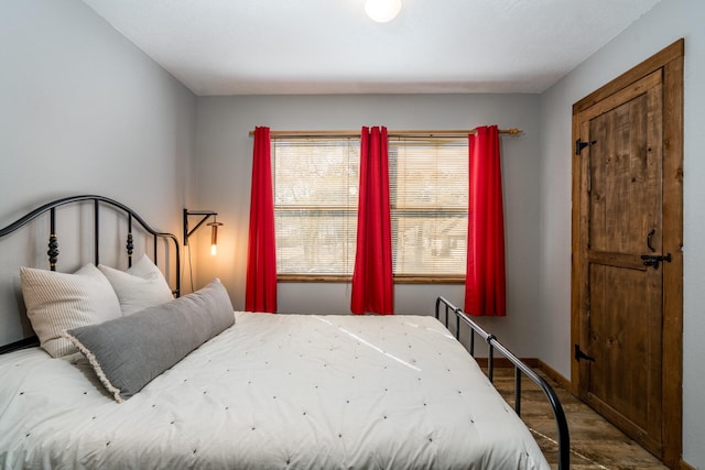 bedroom with multiple windows