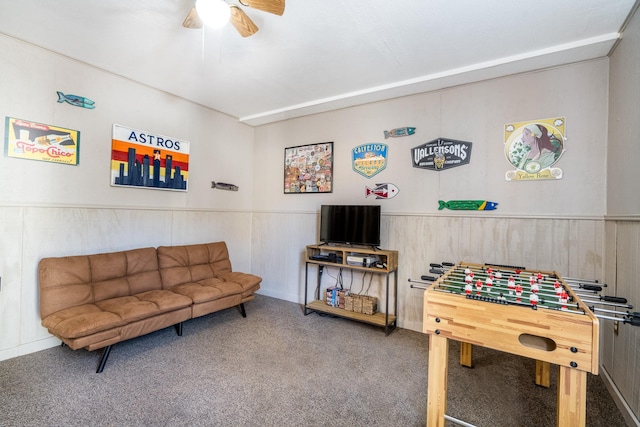 rec room featuring ceiling fan and carpet floors