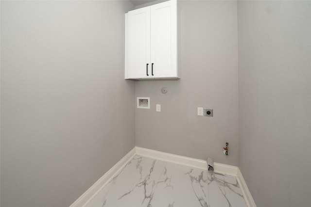 washroom with gas dryer hookup, cabinets, washer hookup, and electric dryer hookup