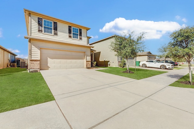 view of front of house with a garage and a front yard