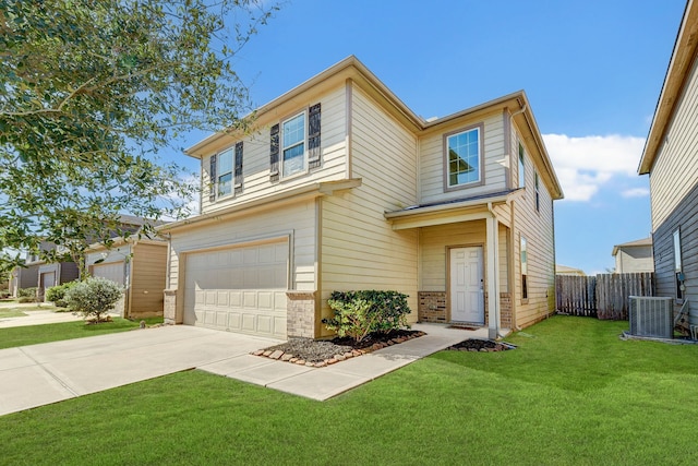 view of front facade featuring a garage, a front yard, and central air condition unit