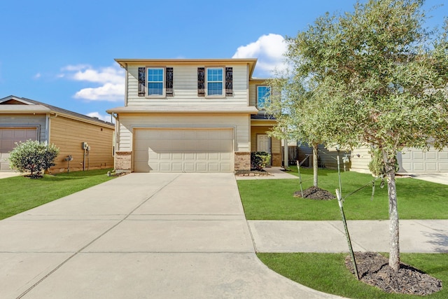 view of front of property featuring a garage and a front lawn