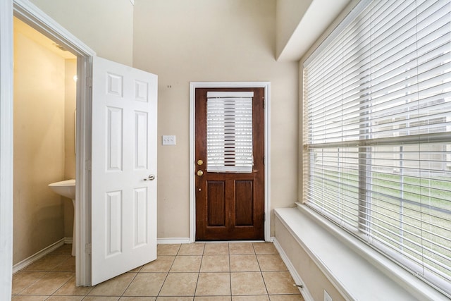 foyer with light tile patterned floors