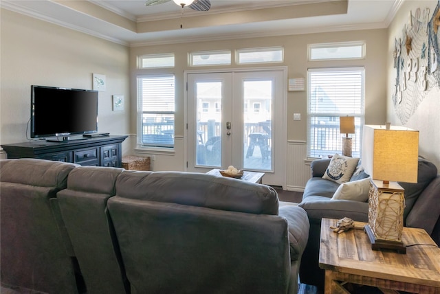 living room featuring french doors, ceiling fan, ornamental molding, and wood-type flooring