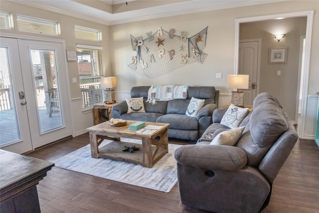 living room with ornamental molding, dark hardwood / wood-style flooring, and french doors