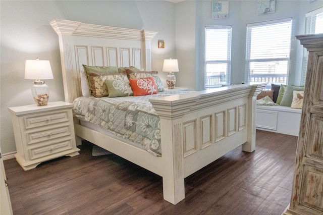 bedroom featuring dark hardwood / wood-style flooring