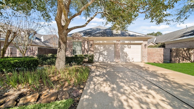 single story home featuring a garage and a mountain view