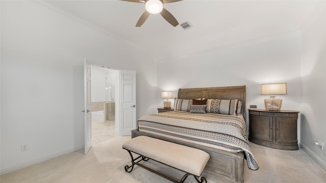 carpeted bedroom with ensuite bath, vaulted ceiling, ornamental molding, and ceiling fan