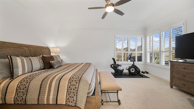 bedroom with light carpet and ceiling fan