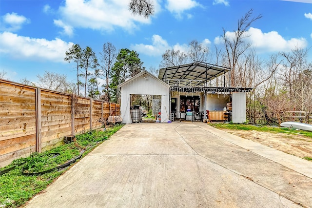 view of outdoor structure with a carport