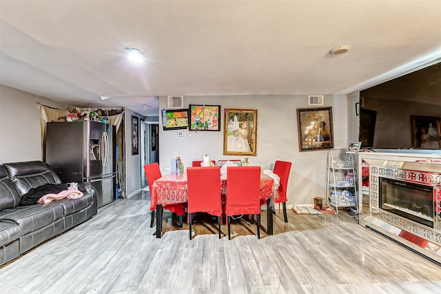 dining area featuring light hardwood / wood-style flooring