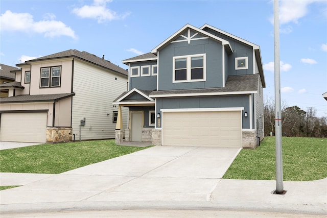 view of front facade featuring a garage and a front yard