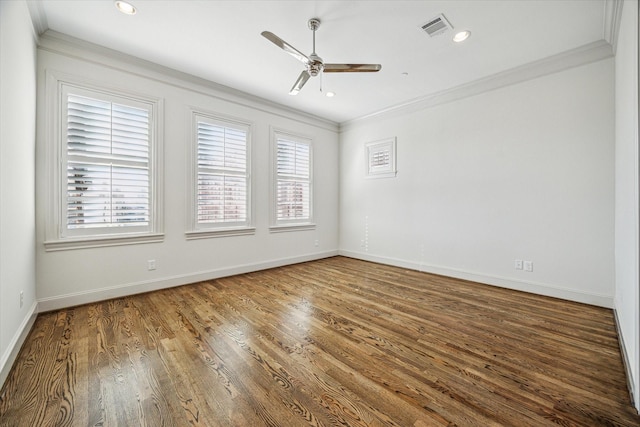 spare room with ornamental molding, wood-type flooring, and ceiling fan