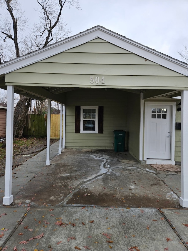 exterior space featuring a carport