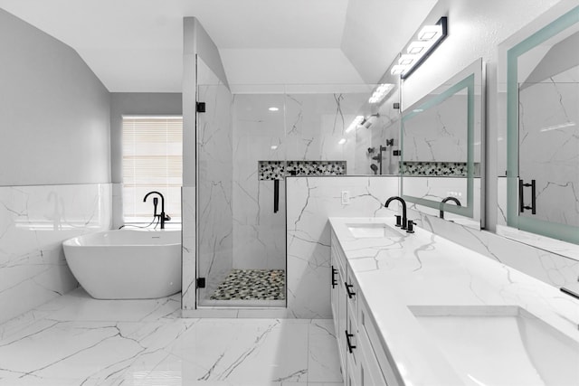 bathroom featuring plus walk in shower, tile walls, and vanity