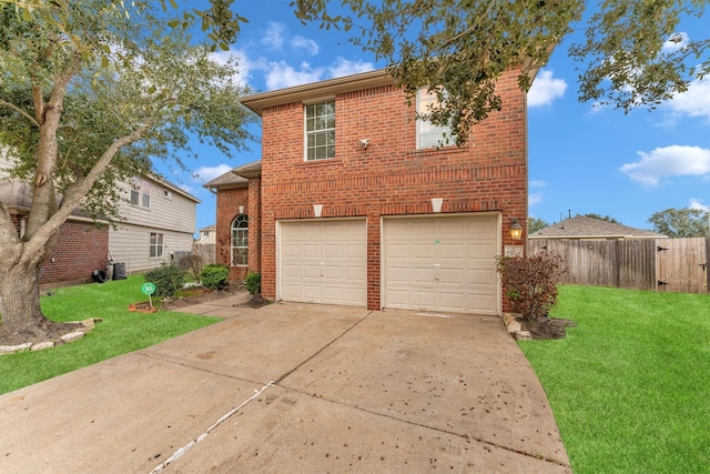 exterior space with a garage and a lawn