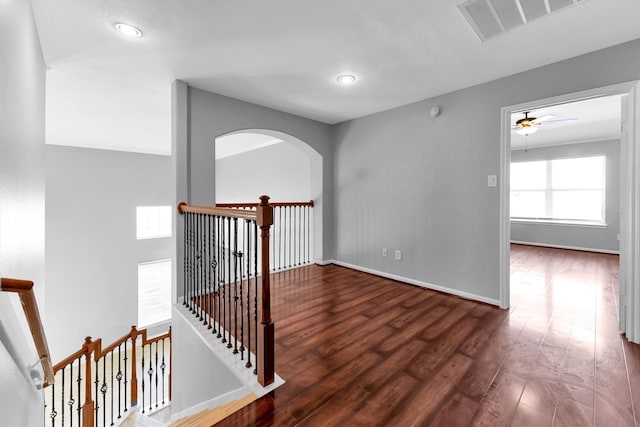 hall featuring dark wood-type flooring