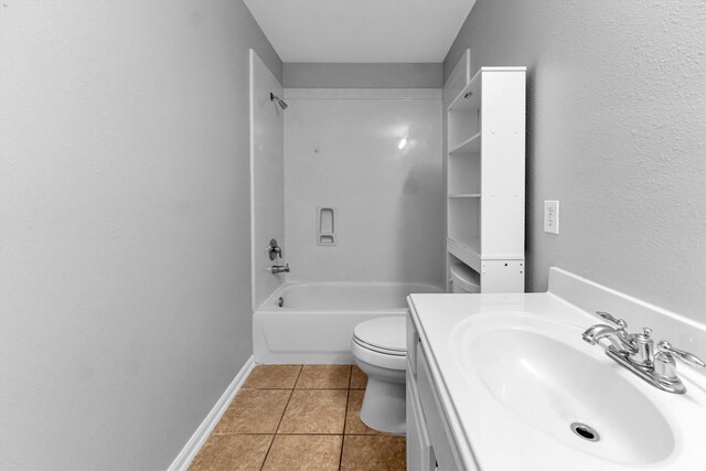 full bathroom featuring shower / tub combination, vanity, toilet, and tile patterned flooring