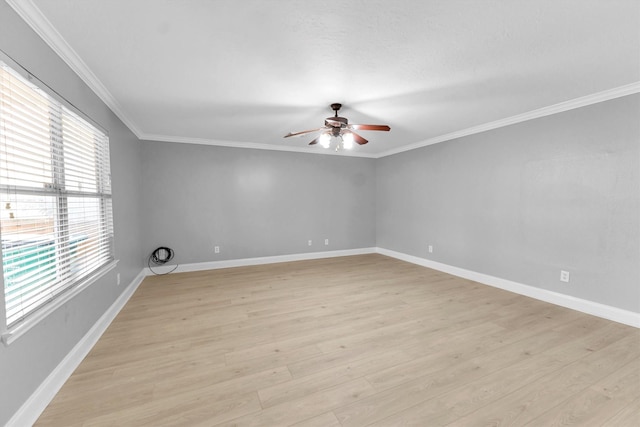 empty room featuring crown molding, ceiling fan, and light hardwood / wood-style flooring