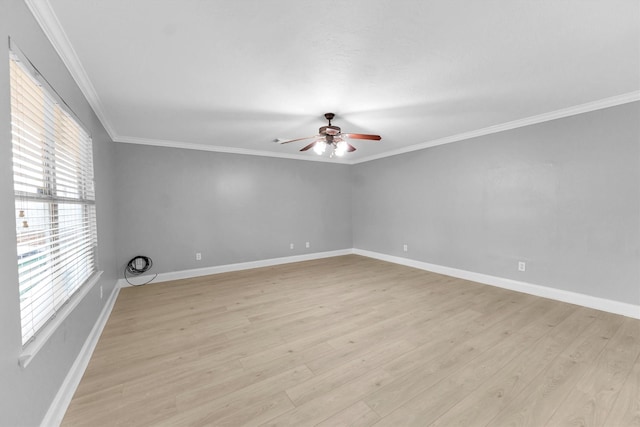 empty room featuring crown molding, light hardwood / wood-style floors, and ceiling fan