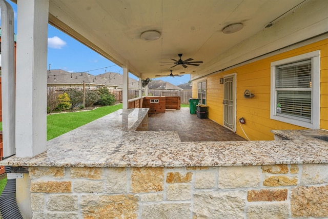 view of patio / terrace with ceiling fan