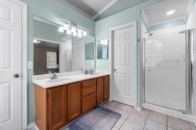 bathroom featuring tile patterned flooring, crown molding, vanity, and walk in shower