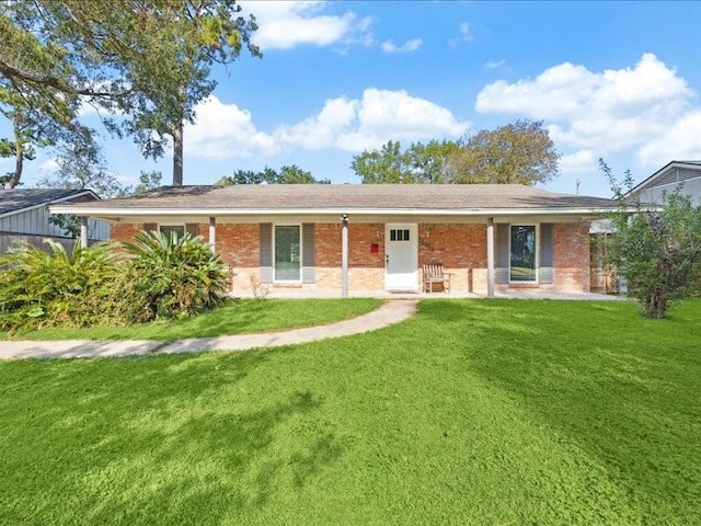 ranch-style house with a front lawn