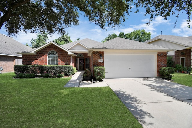 ranch-style house with a garage and a front yard