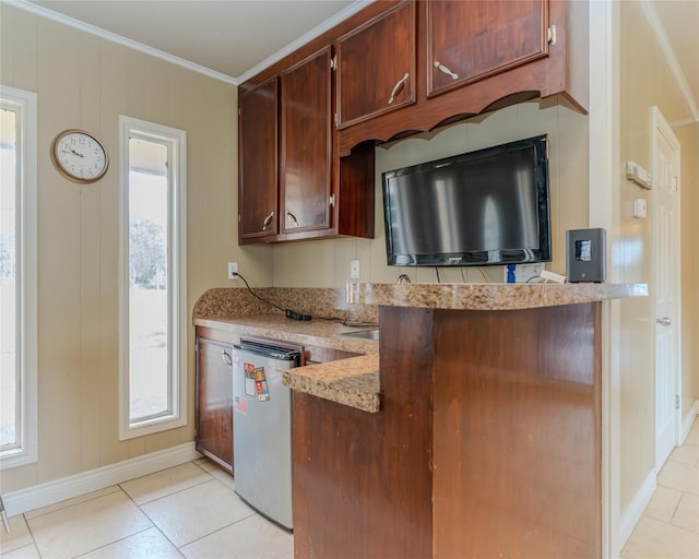 kitchen featuring ornamental molding, dishwashing machine, light stone countertops, and light tile patterned floors