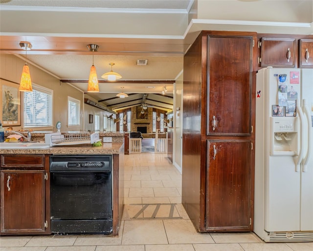 kitchen with sink, decorative light fixtures, light tile patterned floors, white fridge with ice dispenser, and a fireplace